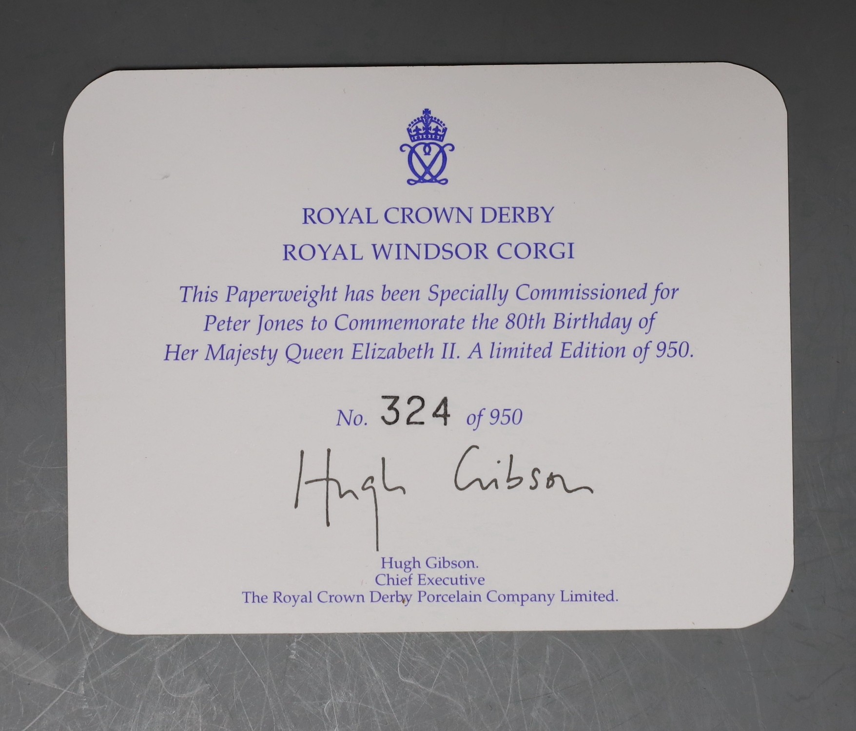 A Royal Crown Derby paperweight - Royal Windsor Corgi, gold stopper, boxed with certificate